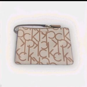 Calvin Klein Beige Monogram Logo Leather Wristlet Never Used 7in x 9in